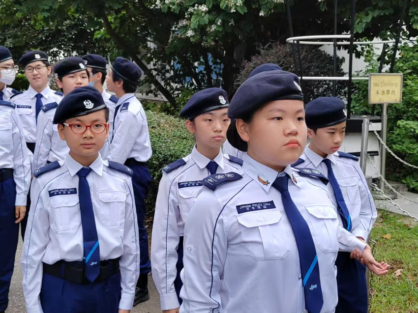 少年警讯金星得奖者徐骅美（前）参加在位于黄竹坑的香港警察学院举行的中式步操会操（2024年11月10日摄）。