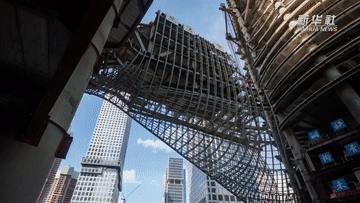 大湾区新地标6000吨“巨龙”120米高空实现毫米级合体 大湾区新地标6000吨“巨龙”120米高空实现毫米级合体