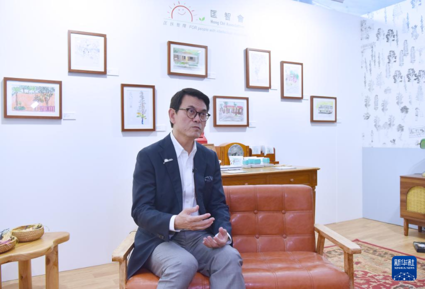 3月25日,匡智会主席邱腾华接受记者采访。 3月25日,匡智会主席邱腾华接受记者采访。